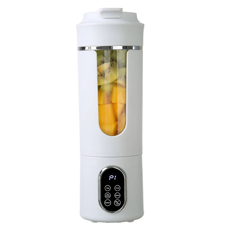 Portable white personal blender with a digital control panel and clear window showing chopped fruit inside.