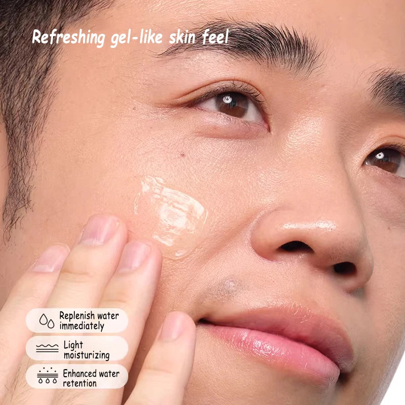 A close-up of a finger applying a clear, refreshing, gel-like moisturizer to a man's cheek for hydrated skin.
