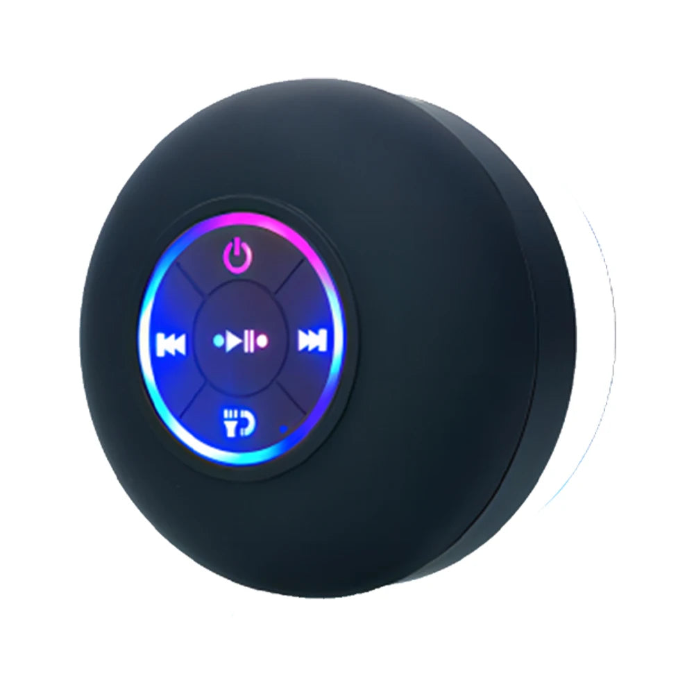 Round black portable shower speaker with illuminated blue playback control buttons and LED ring light.