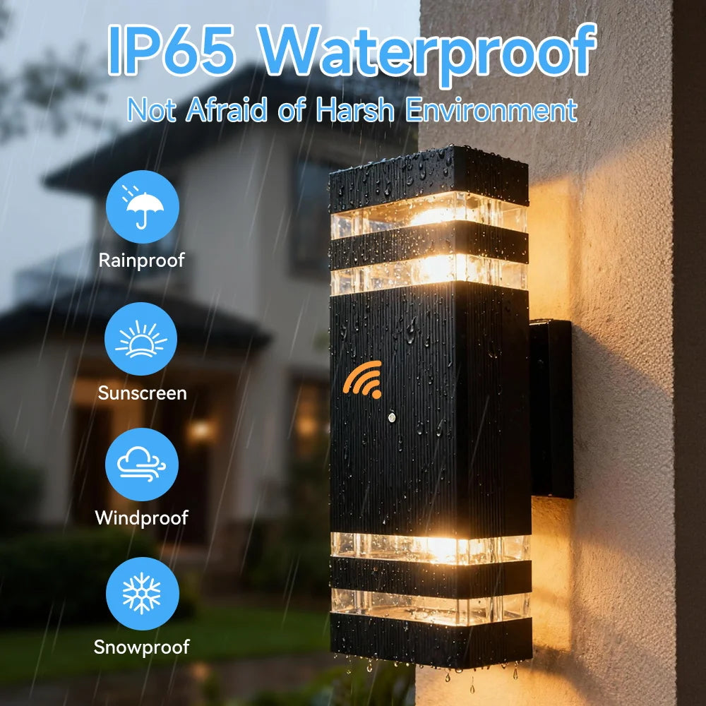 Modern black rectangular LED wall light with motion sensor, showing a warm glow and weatherproof design.