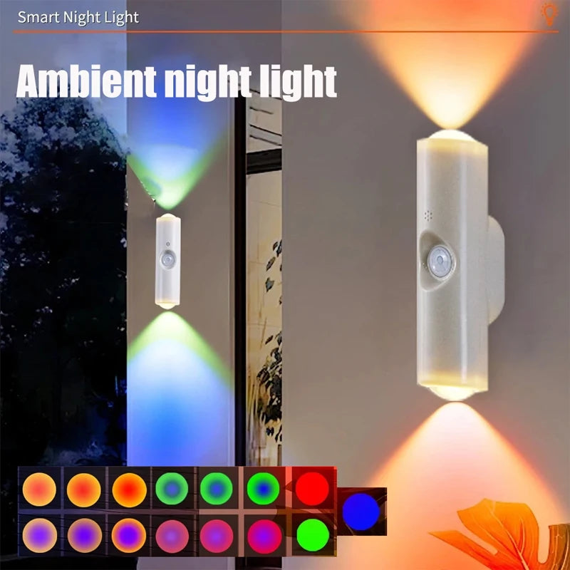 Minimalist white rechargeable LED wall lamp with motion sensor, emitting multi-coloured ambient light beams.