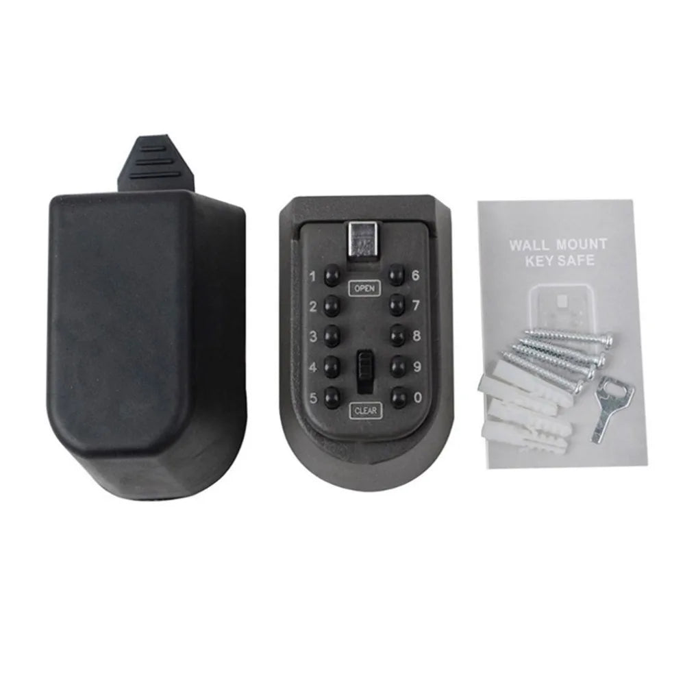 Black metal wall-mount key safe with a push-button combination lock, mounting screws, wall plugs, and a small key.