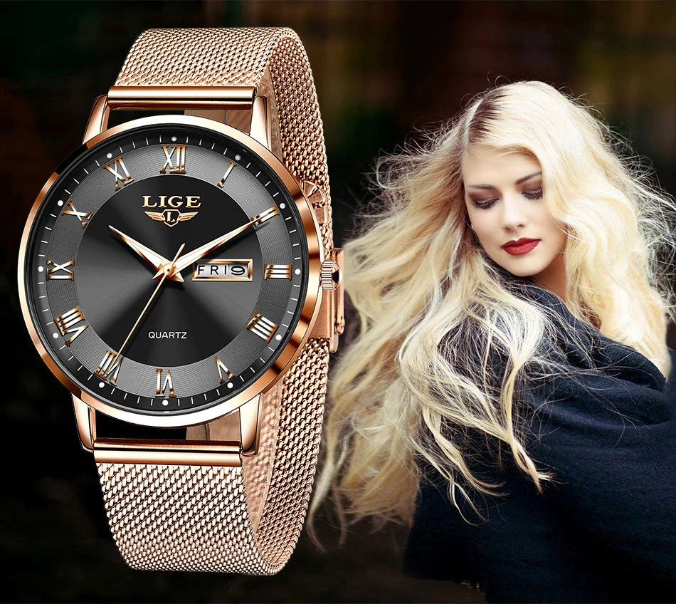 Elegant rose gold mesh bracelet watch with a round black dial, Roman numerals, and a day-date display.