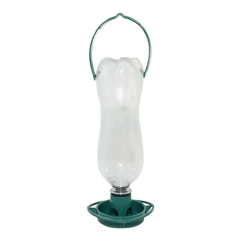 Clear plastic bottle bird feeder with a green base and matching hanging handle against a white background.