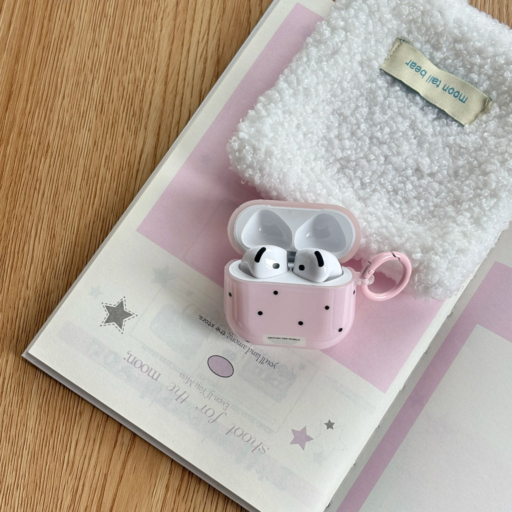 Pink polka-dot hard plastic AirPods case with matching keyring, designed for standard AirPods.