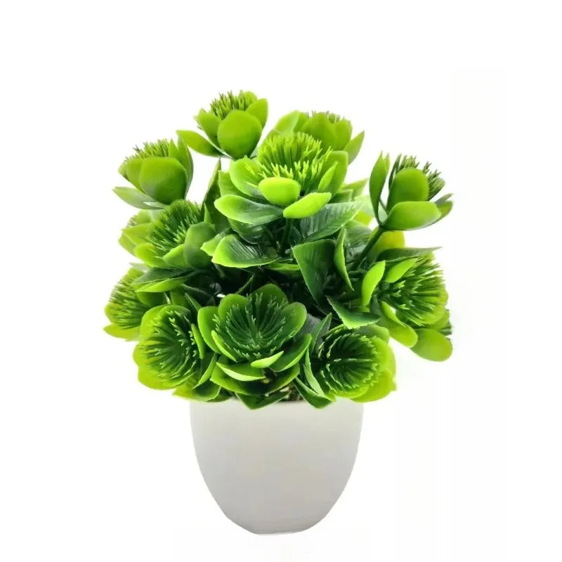 A small artificial plant with bright green, spiky-petaled flowers in a plain, rounded white plastic pot.