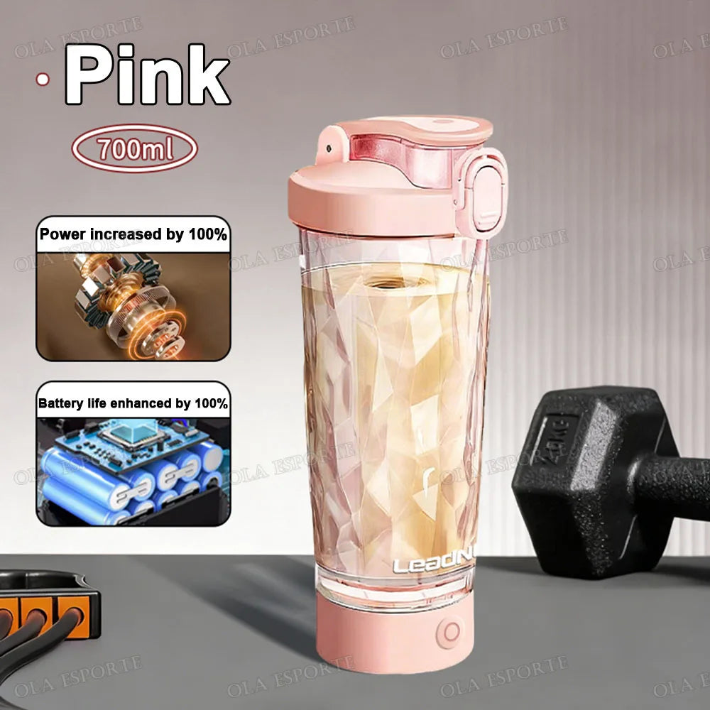 Pink 700ml portable electric protein shaker bottle with a faceted, geometric clear body and a locking flip-top lid.