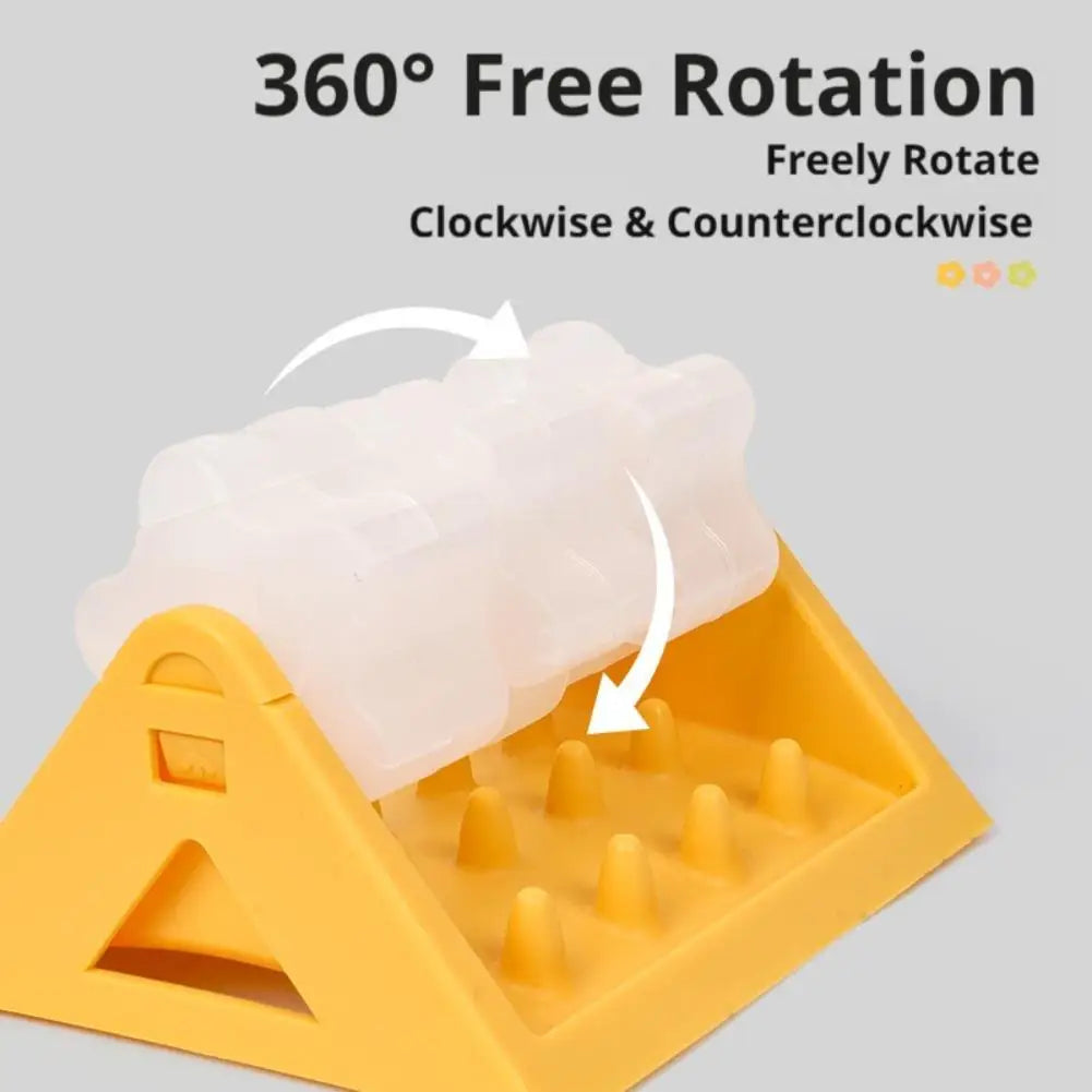 Yellow, triangular interactive dog puzzle feeder with a 360-degree rotating clear treat dispenser.