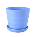 Light blue, cylindrical plastic flower pot with a subtle horizontal ribbed texture and a matching circular tray.