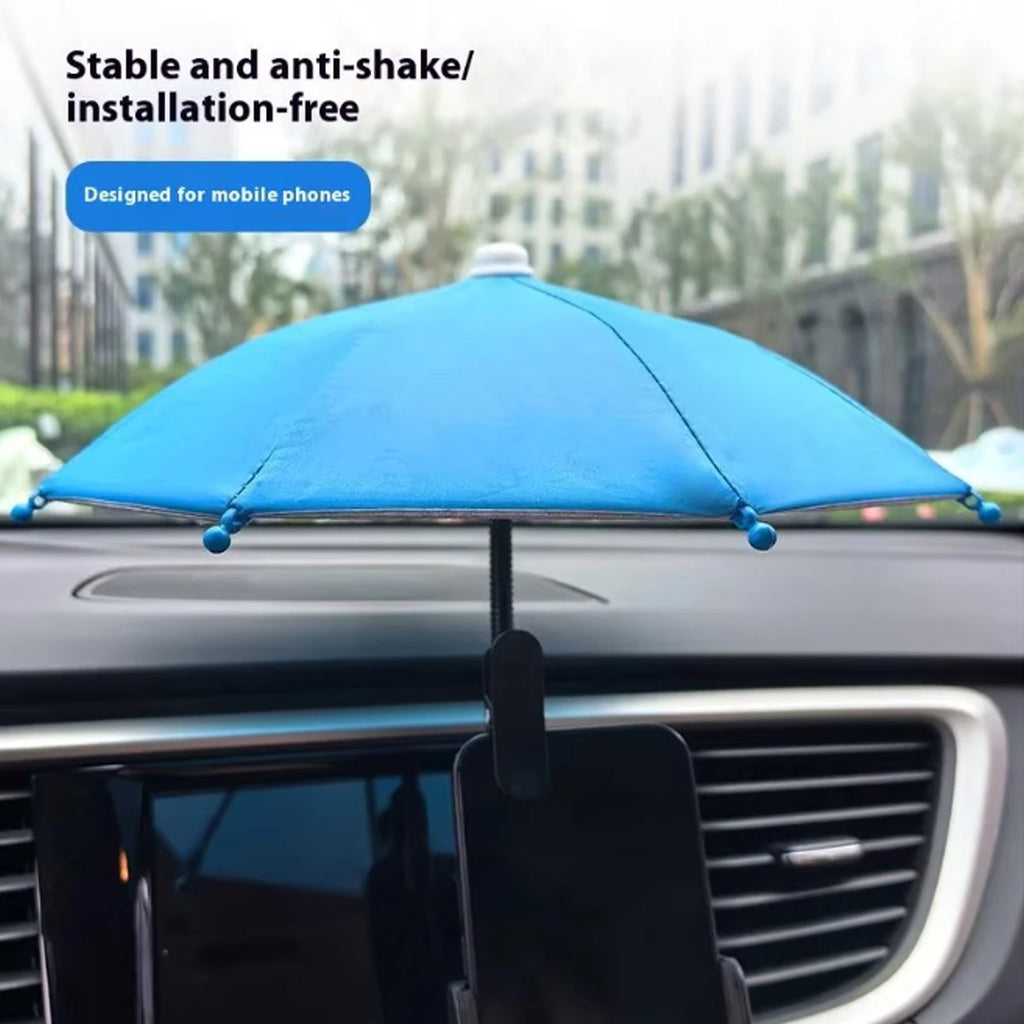 Blue sun-shade umbrella for mobile phones, mounted on a car dashboard holder for anti-glare protection.