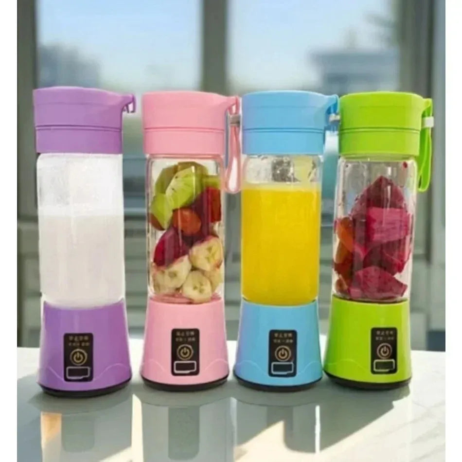 Four portable, rechargeable electric blenders in purple, pink, blue, and green, with fruit inside and power buttons.