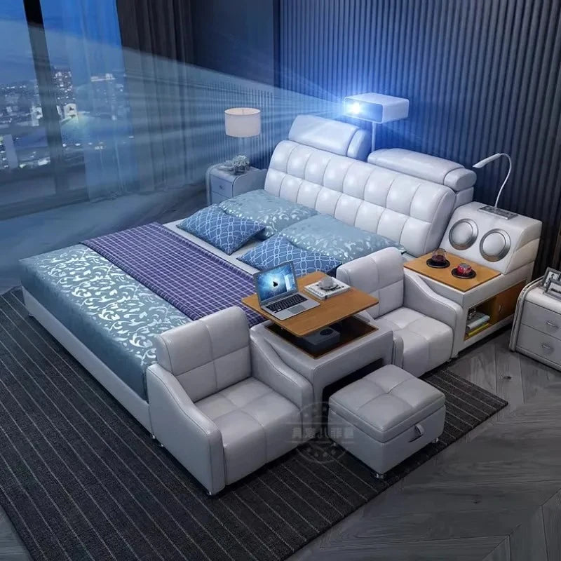 Modern white leather storage bed featuring a padded headboard, integrated desk, side seating, and built-in speakers.