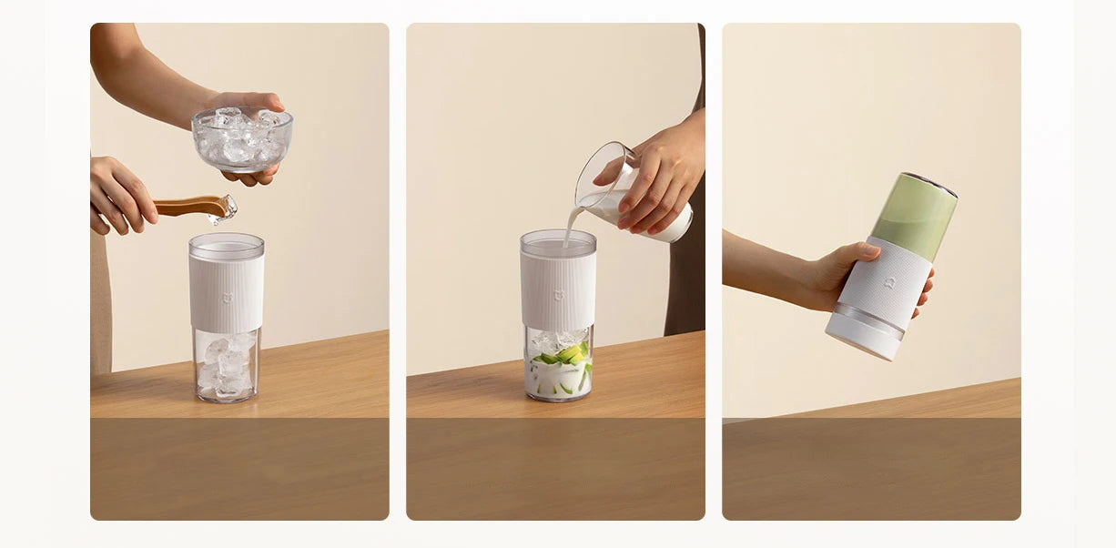 A portable, minimalist white and light green personal blender being filled with ice and milk.