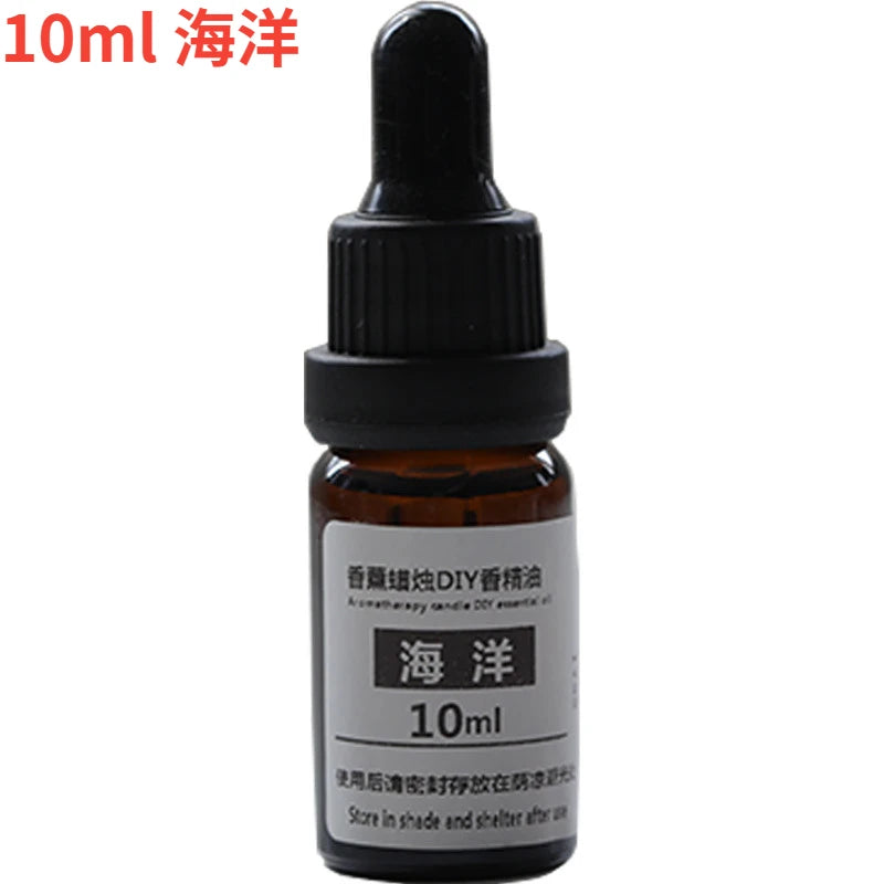 10ml amber glass essential oil bottle with a black dropper cap and a white label, isolated on a white background.