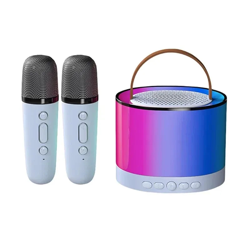 Portable karaoke set with two light-blue microphones and a cylinder speaker with pink-to-blue gradient RGB lighting.
