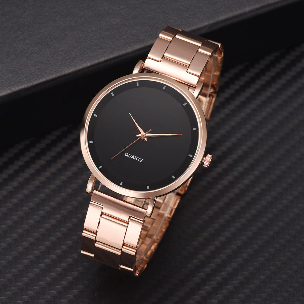 Ladies' rose gold stainless steel watch with a sleek black minimalist dial and matching rose gold hands.