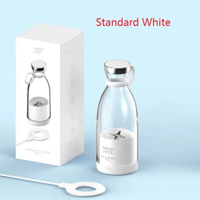White portable blender bottle with a sleek minimalist design, clear container, and wireless magnetic charging base.