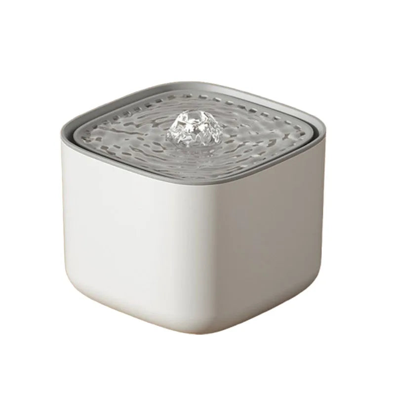 Square white and grey pet water fountain with a bubbling top surface.