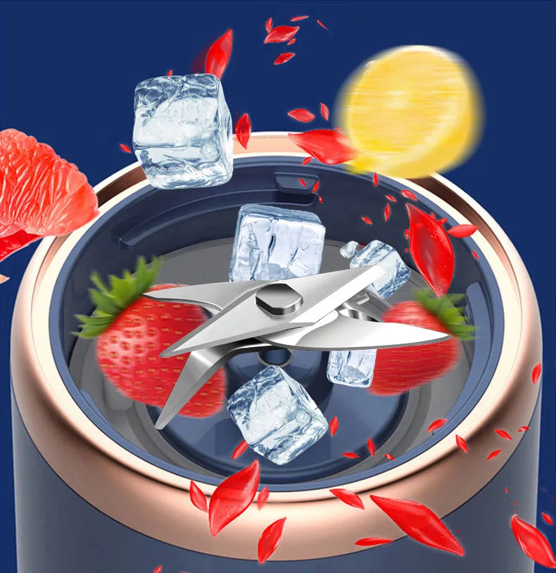 A dark blue portable blender with a rose gold rim, featuring internal metal blades, floating ice cubes, and strawberries.