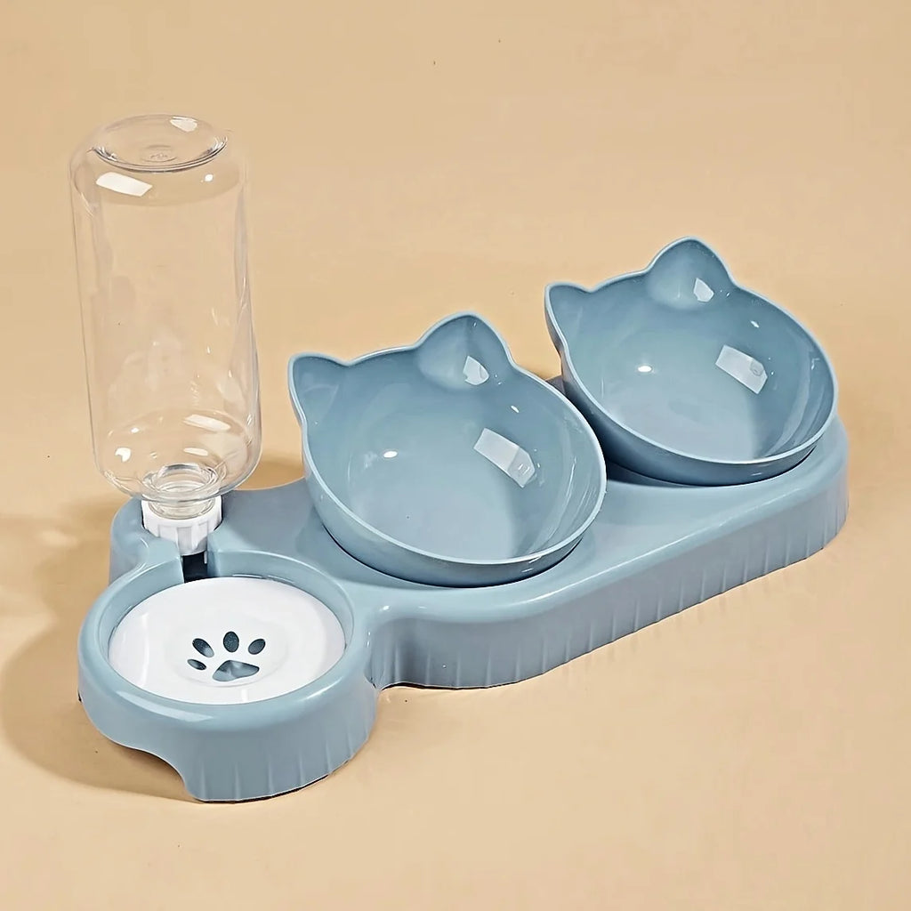 Blue 3-in-1 pet feeding station with two cat-shaped bowls, a white paw-print water tray and clear gravity bottle.