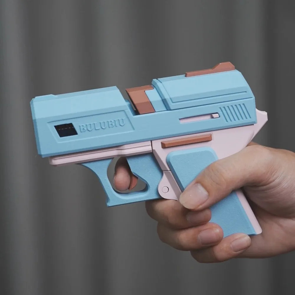 Blue and pink matte plastic pistol-style case for AirPods, held in hand.