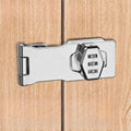 Silver-coloured metal hasp lock with a three-digit combination dial mounted on a light wood-grain surface.