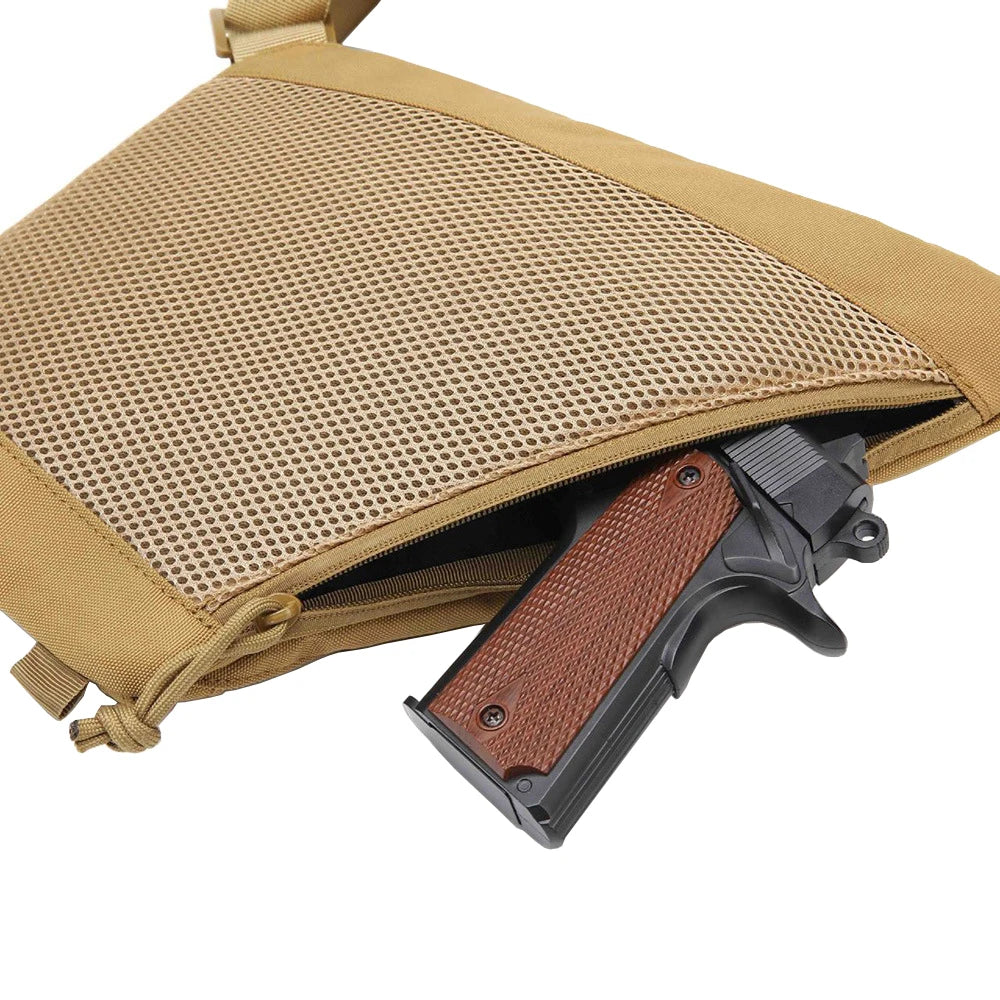 Tan tactical crossbody sling bag featuring a mesh front pocket and a handgun stored in the zipped compartment.