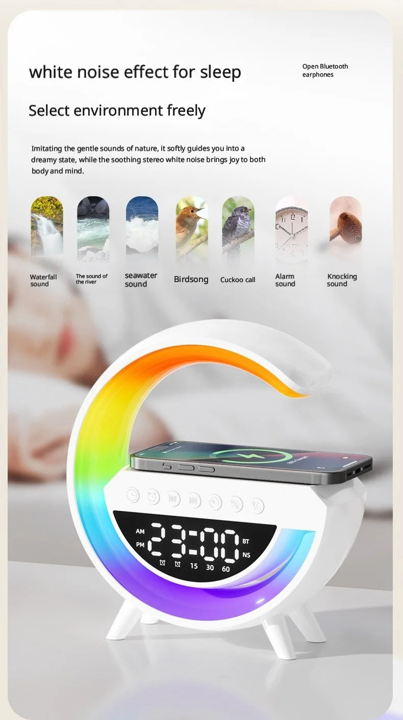 White crescent-shaped alarm clock with a rainbow LED light, digital display, and a smartphone wireless charging base.