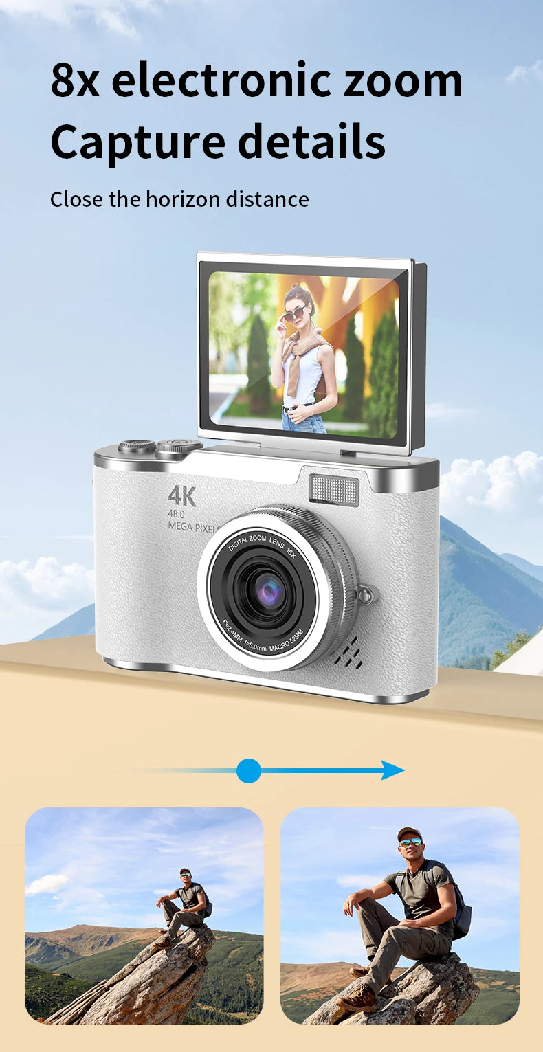 White digital camera with 4K lens and flip-up screen, showing 8x electronic zoom capability.