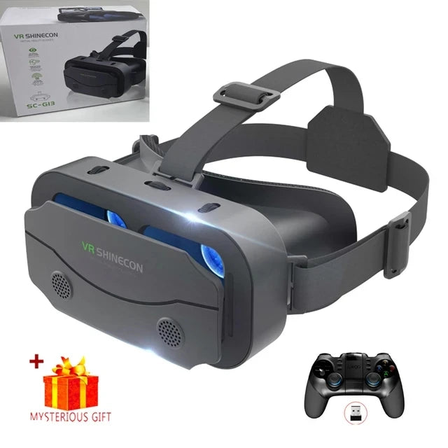 Dark gray VR headset with adjustable straps, blue lenses, front speaker grills, and a matching game controller.