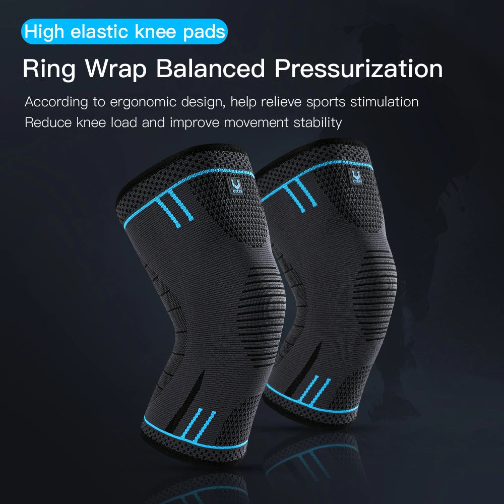 A pair of grey, high-elastic compression knee supports with blue accent stripes and ergonomic knit design.