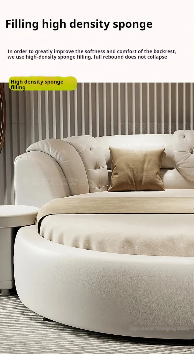 Modern cream-coloured round double bed with a tufted, high-density sponge-filled headboard and soft beige accent pillow.