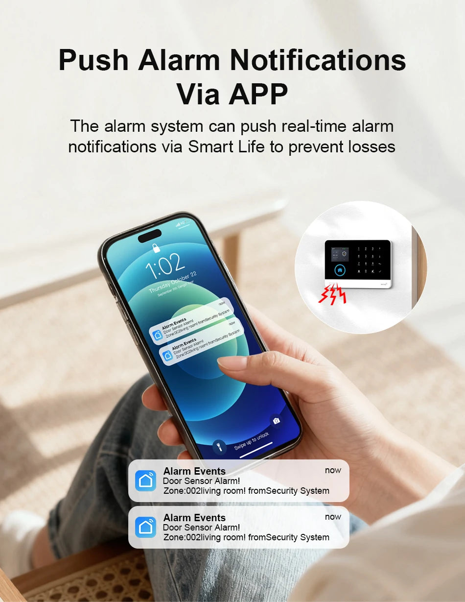 Smartphone showing home security alarm notifications, with an inset image of a sleek black and white alarm keypad.