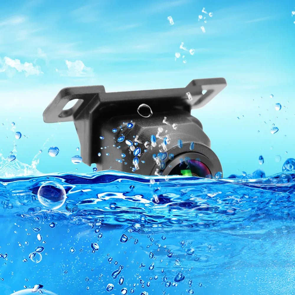 Black 1080p vehicle reversing camera with a fisheye lens, shown half-submerged in water to highlight its waterproof design.