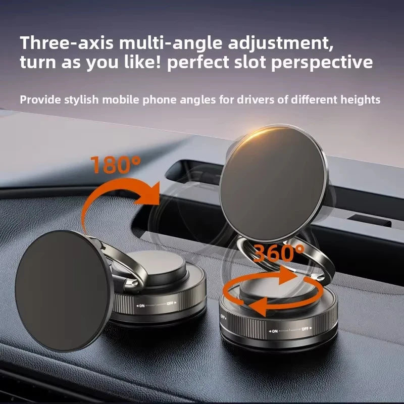 Black magnetic car phone mount on a dashboard with a circular, adjustable design showing 180 and 360-degree rotation.