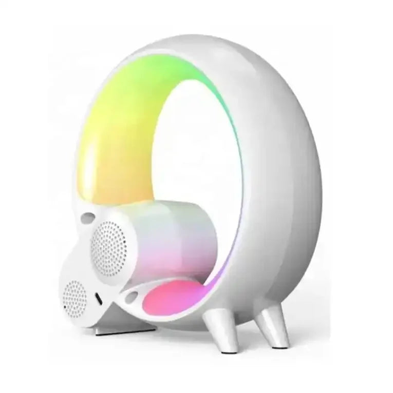 White circular LED wake-up light with integrated speakers, glowing with a colourful rainbow spectrum.