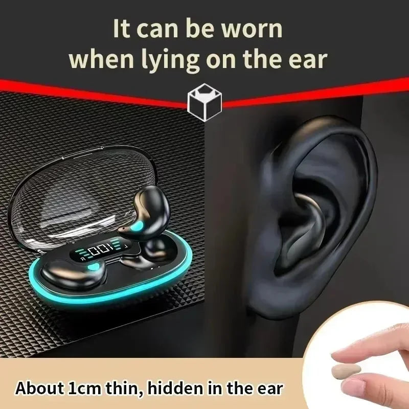 Black wireless earbuds with a glowing charging case, shown being worn in the ear for a discreet, low-profile fit.