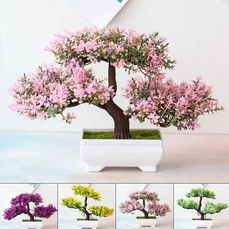 Artificial bonsai tree with pink leaves in a white rectangular pot, shown against a soft white background.
