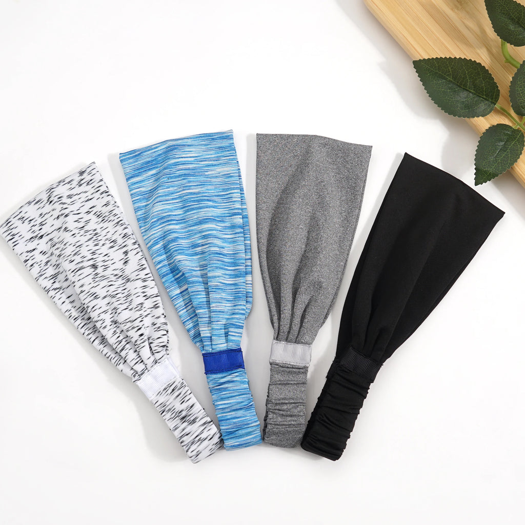Four stretchy sports headbands in white marl, blue space-dye, grey marl, and solid black.