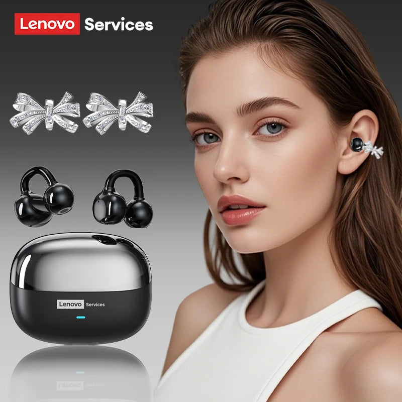 Black and silver wireless earbuds with decorative, crystal-embellished bow ear cuffs and a matching charging case.