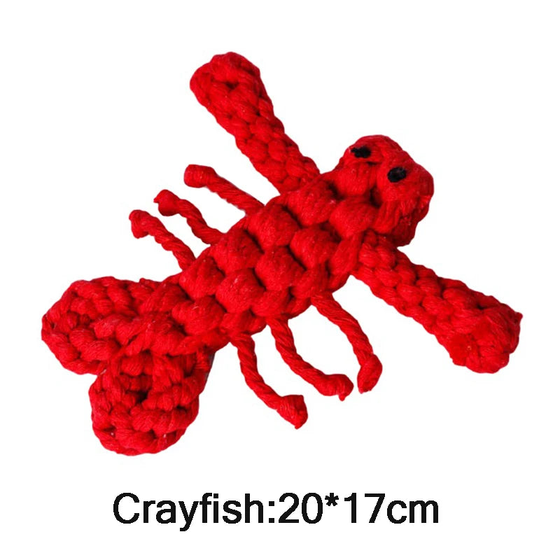 Bright red crayfish-shaped dog rope toy, woven with durable cord for dental cleaning and play.