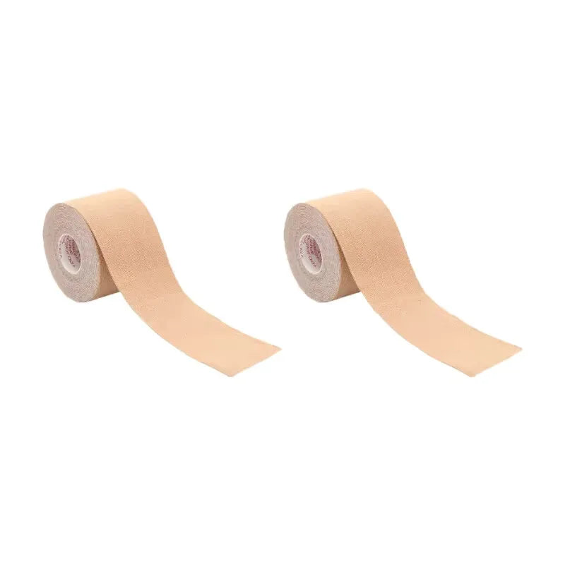 Two rolls of nude-coloured kinesiology tape, shown on a plain white background.