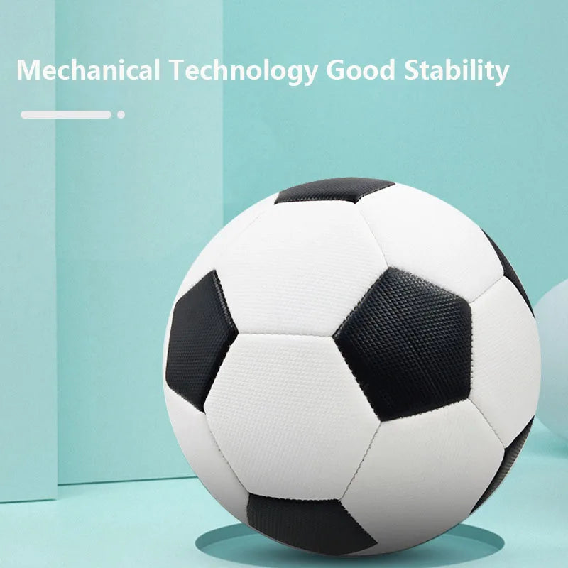 Classic black and white football with a textured finish, set against a light blue background.