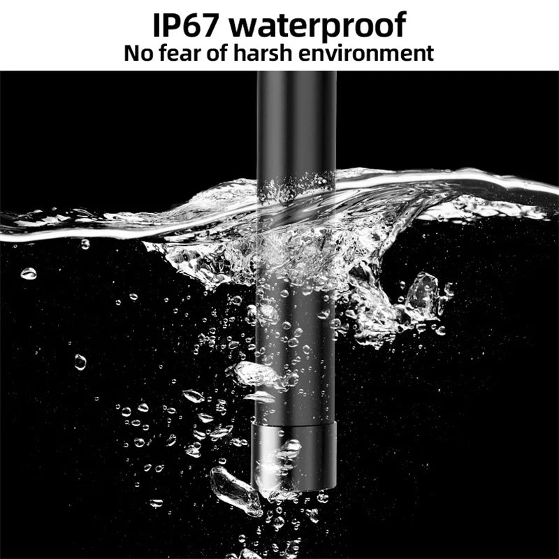 Black industrial inspection endoscope camera probe submerged in water, demonstrating its IP67 waterproof design.