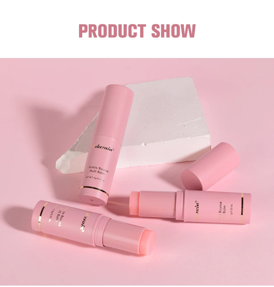 Three pink wrinkle bounce multi-balm sticks in a modern, minimalist cylindrical twist-up design on a pastel background.
