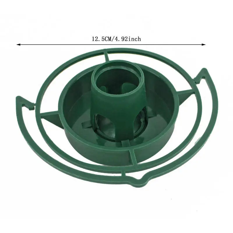 Green, circular plastic floral foam holder measuring 12.5cm/4.92 inches in diameter.