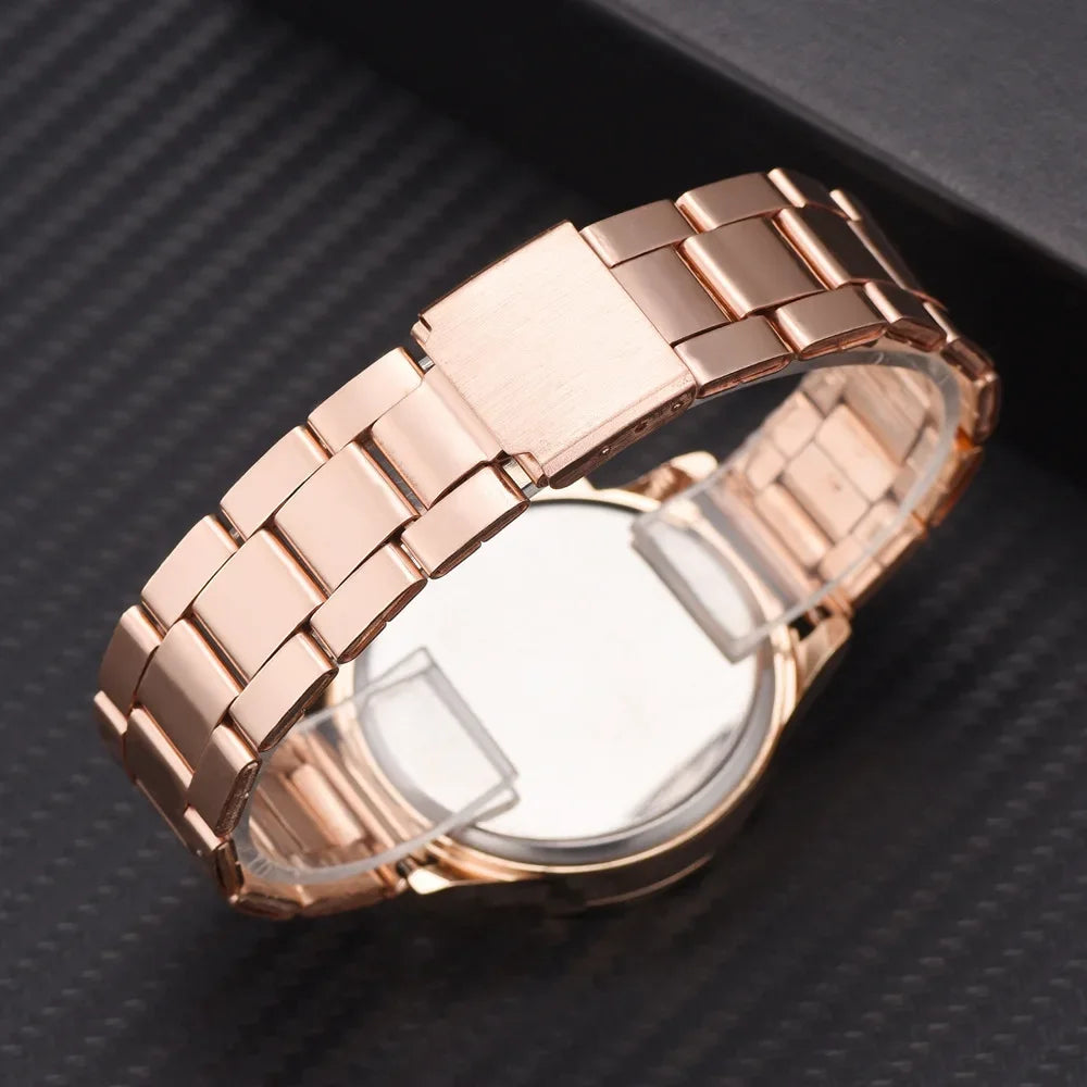 Rose gold ladies' watch with a polished stainless steel link bracelet and secure fold-over clasp.
