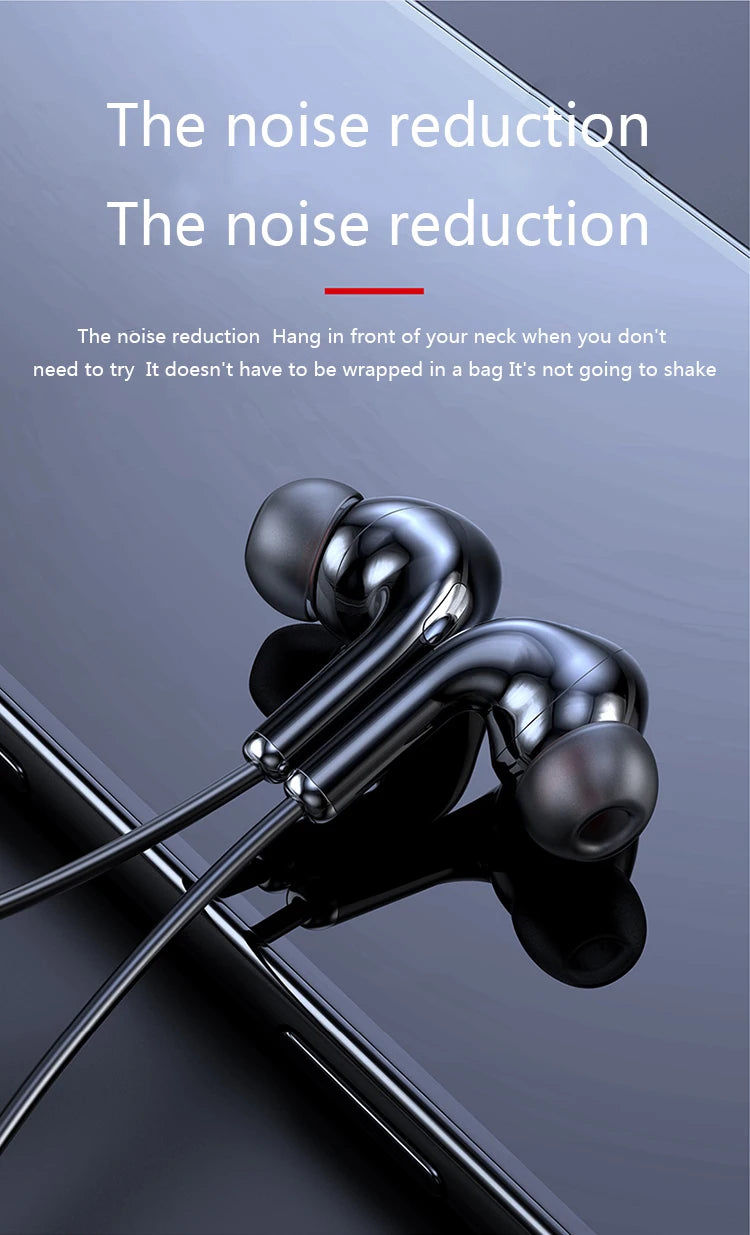 Sleek black wireless magnetic in-ear headphones with noise cancellation, resting on a dark reflective surface.