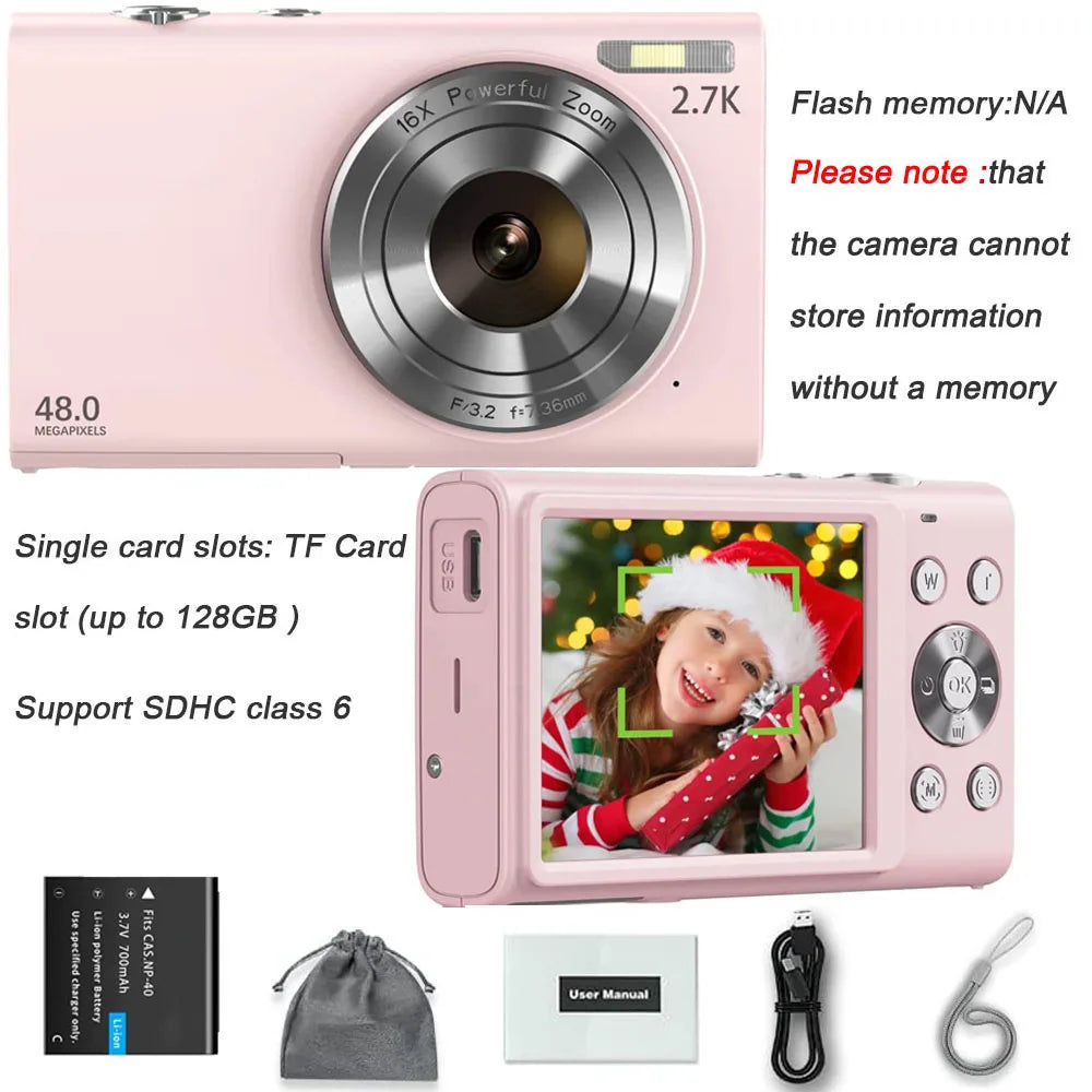 Pink digital camera with 48MP, 16x zoom, LCD screen, rechargeable battery, USB cable, pouch, and wrist strap.
