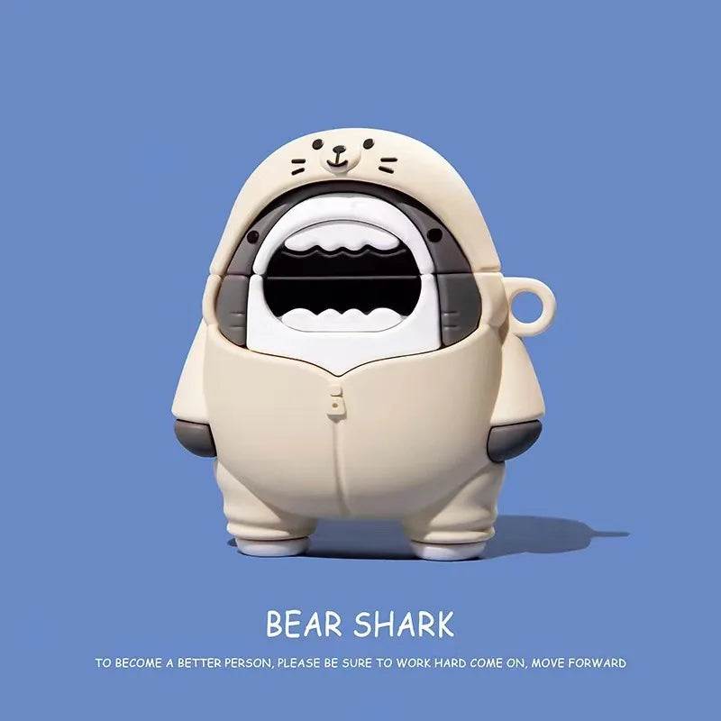 Cream silicone AirPods case featuring a cute bear shark character design. Fits standard AirPods charging cases.